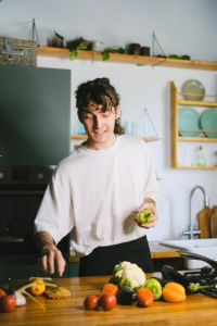 A Man Holding Vegetables