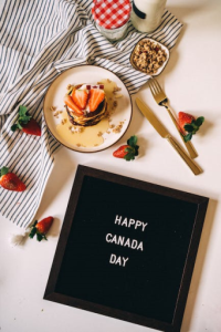 Letterboard Beside A Plate of Pancakes