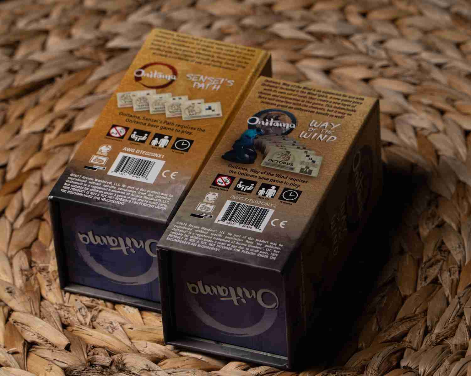 two boxes of yogurt sitting on top of a wicker basket