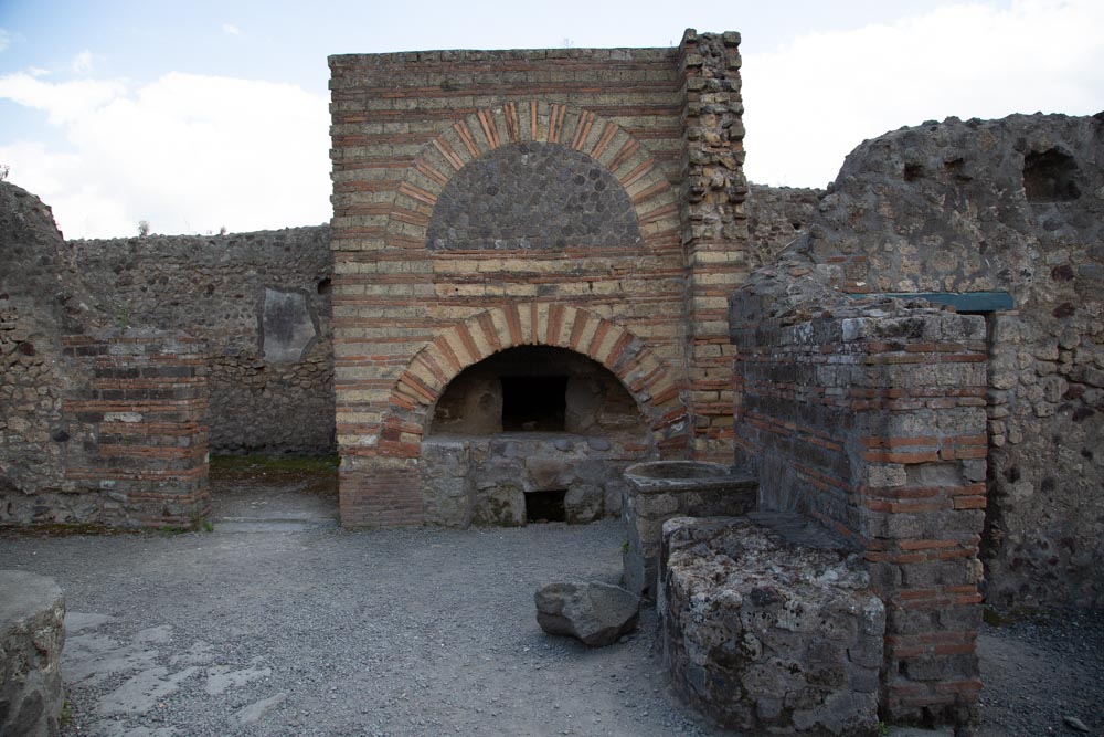 Italy, Pompeii, the Bakery of Numerius Popidius Priscus, with the oven and the stone millstones2