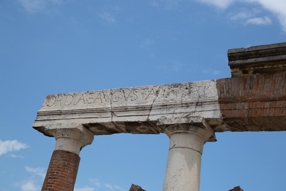 Italy, Pompeii, Roman Forum, Portico with Corinthian columns with inscription