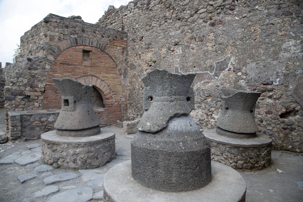Italy, Pompeii, the Bakery of Numerius Popidius Priscus, with the oven and the stone millstones3