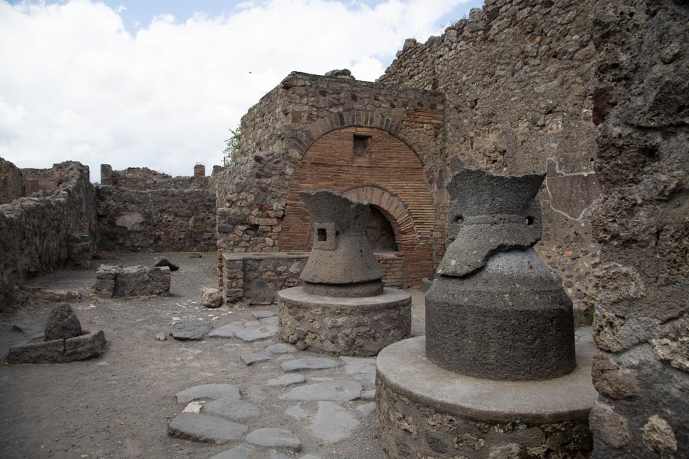 Italy, Pompeii, Bakery of Numerius Popidius  Priscus, with the oven and the stone  millstones