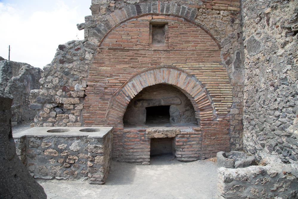 Italy, Pompeii, Bakery of Numerius Popidius Priscus, with the oven and the stone  millstones