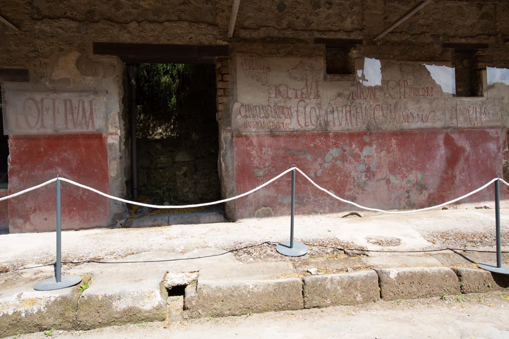 Italy, Pompeii, Via dell'Abondanza, Graffity on the walls, electoral slogans
