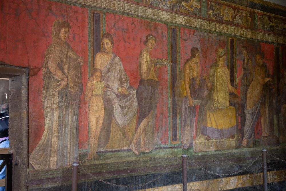 Italy, Pompeii, Villa of the Mysteries, Triclinium with large frieze contains 28 human figures on a podium