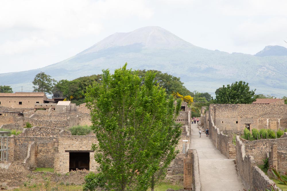 Italy, Pompeii, walls of houses, the Mount of Vesuvius in the background