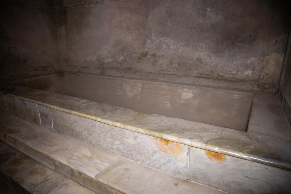 Italy, Pompeii,Forum Baths, view of room with bath