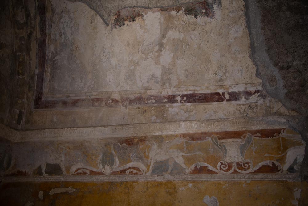 Italy, Pompeii,Forum Baths, view of the Tapidaruim with coloured stucco and shelves separated by telamones