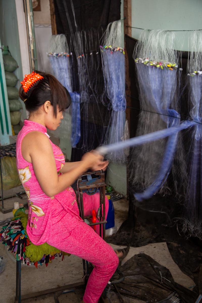 Vietnam, Mekong river - Preparation of fishing nets