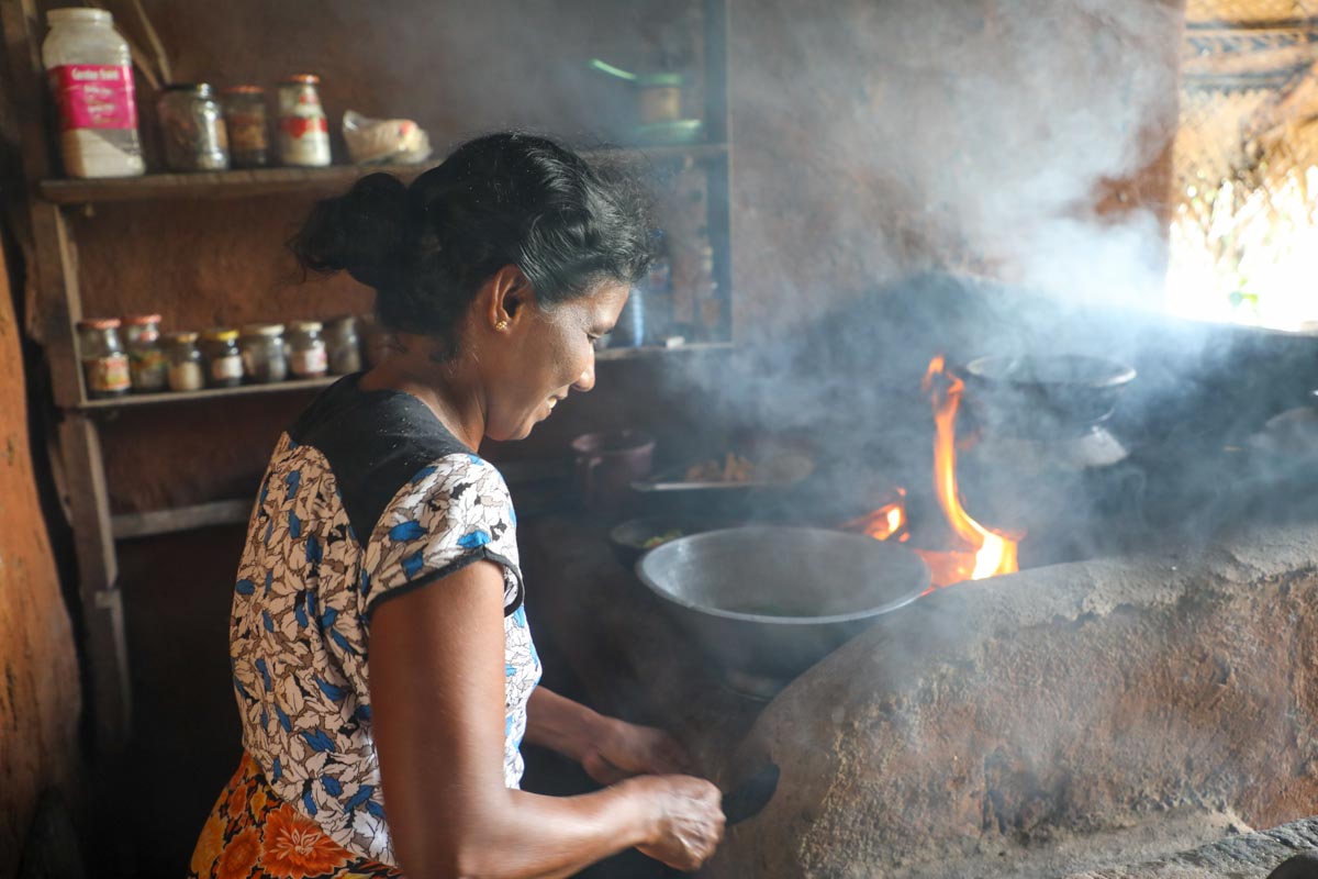 Sri Lanka, Traditional - A Sri Lankan woman prepares lunch at a traditional home