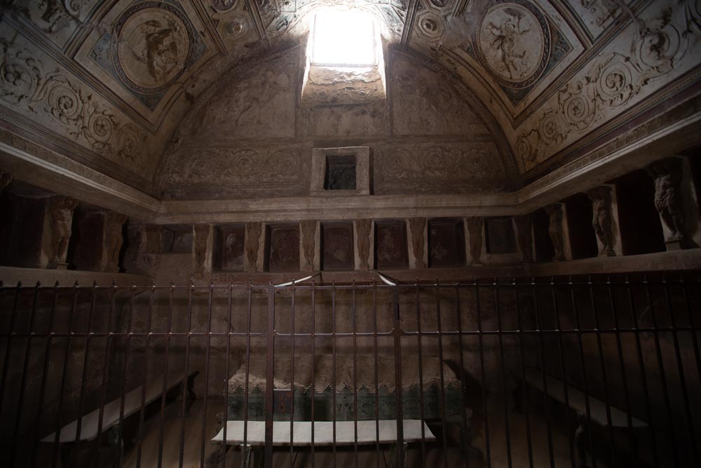 Italy, Pompeii, Forum Baths, view of the Tapidaruim with coloured stucco and shelves separated by telamones