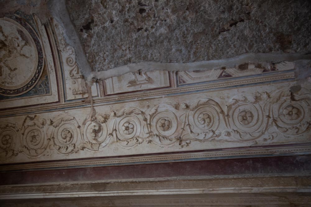 Italy, Pompeii, Forum Baths, view of the Tapidaruim with coloured stucco and shelves separated by telamones