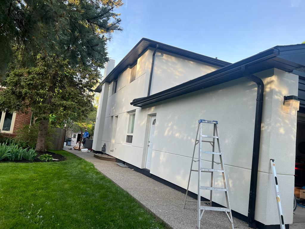 Finished white stucco house