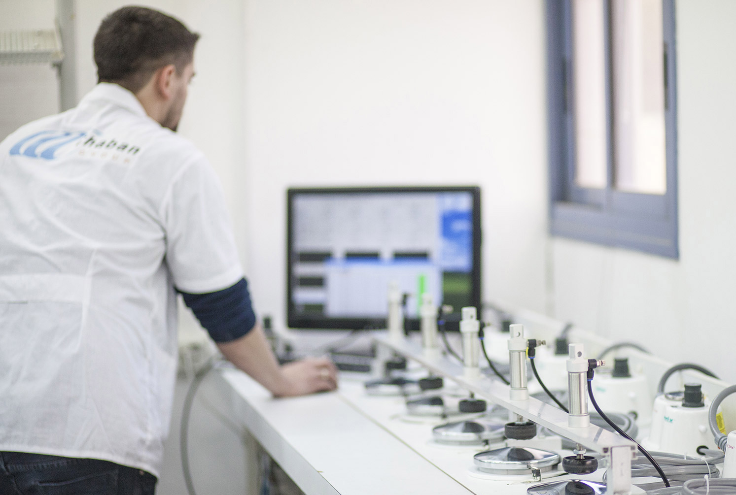 Chaban Group engineer at an automated test station