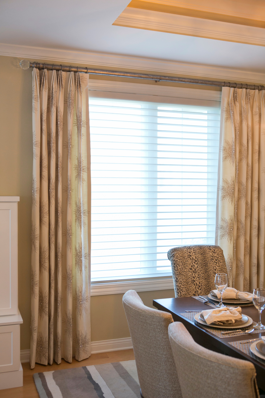 Layered window treatments that insulate a room