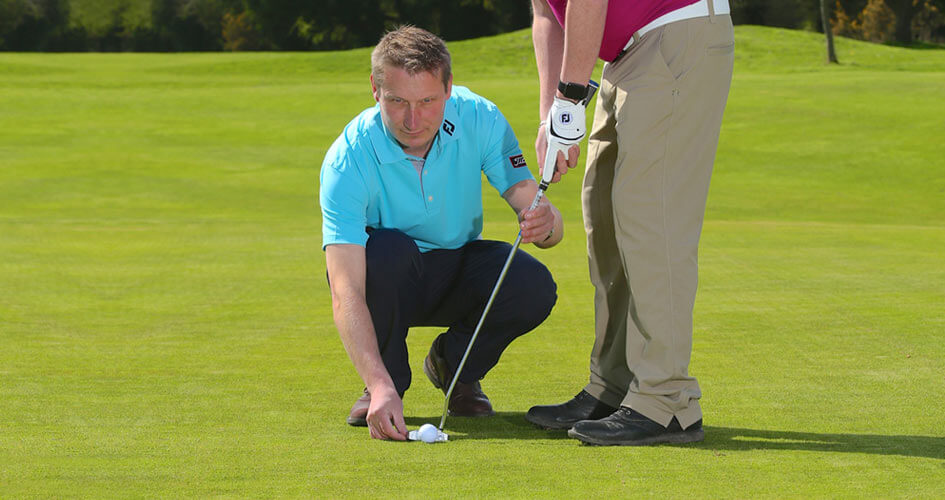 A golf lesson in progress