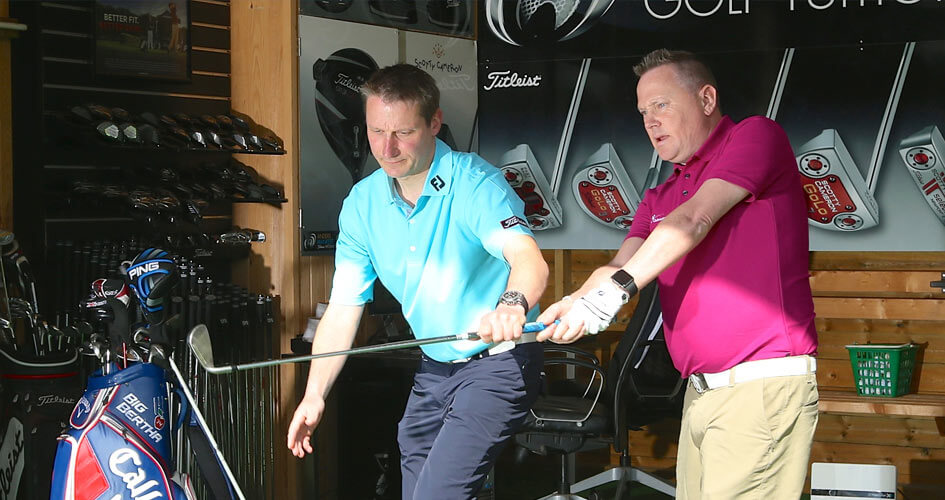 A golf lesson in progress