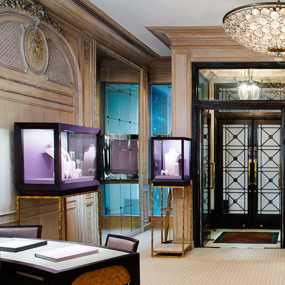 David Morris interior. A luxury theme in wood with purple lit glass display cabinets