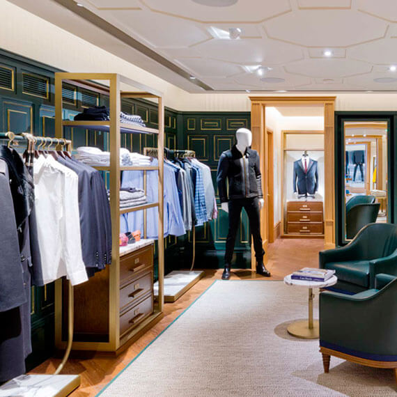 Kent and Curwen men's section, showing shirt racks and seating area