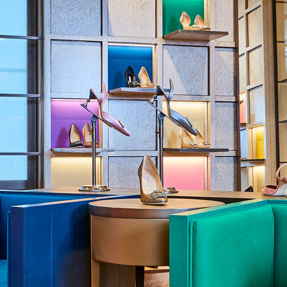 Malono Blahnik seating and display wall at Selfridges