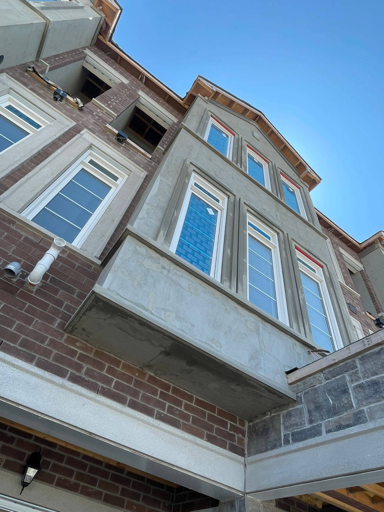 Brick and stucco facade completed by SSF Construction
