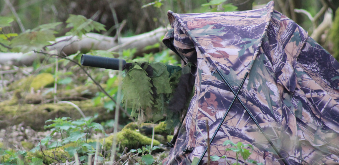 Remington .308 set up with Bipod inside Sniperhide and scrim on moderator. Bipod can also be set up to sit outside the front flap to alter sniping position inside the hide for the shooter.
