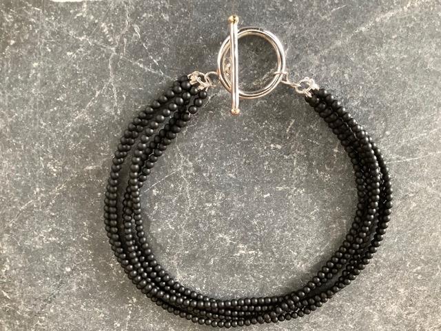 Neck jewellery by Elisabeth Soppelsa - Obsidian, Sterling Silver & 14 K Gold