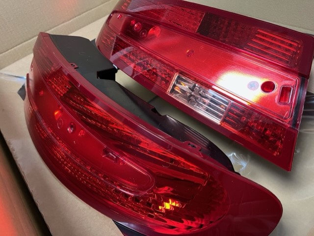 On offer is a full set of Aston Martin Vantage V8/V12 Rear Lights in Red. The set comprises of the left and right cluster and the boot lid brake light. Fixings/ Seals may be required if you don’t have them. They are in excellent clean working order with no scratches or damage to the lenses and have never had any condensation problems. Ready for shipping unless collection is preferred. £1150.00