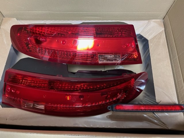 On offer is a full set of Aston Martin Vantage V8/V12 Rear Lights in Red. The set comprises of the left and right cluster and the boot lid brake light. Fixings/ Seals may be required if you don’t have them. They are in excellent clean working order with no scratches or damage to the lenses and have never had any condensation problems. Ready for shipping unless collection is preferred. £1150.00