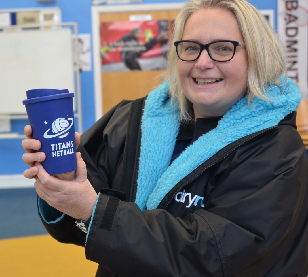 Nov 2019 - Lorraine Beel modelling Titans new Mugs and Dry Robe