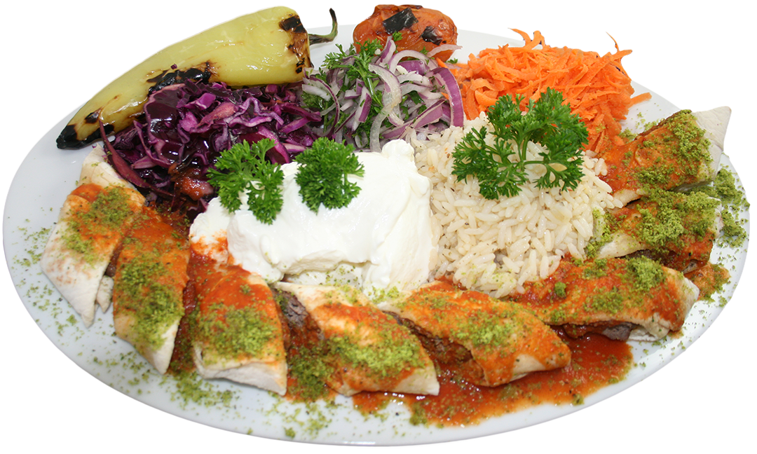 Iskender kebab platter with rice and salad