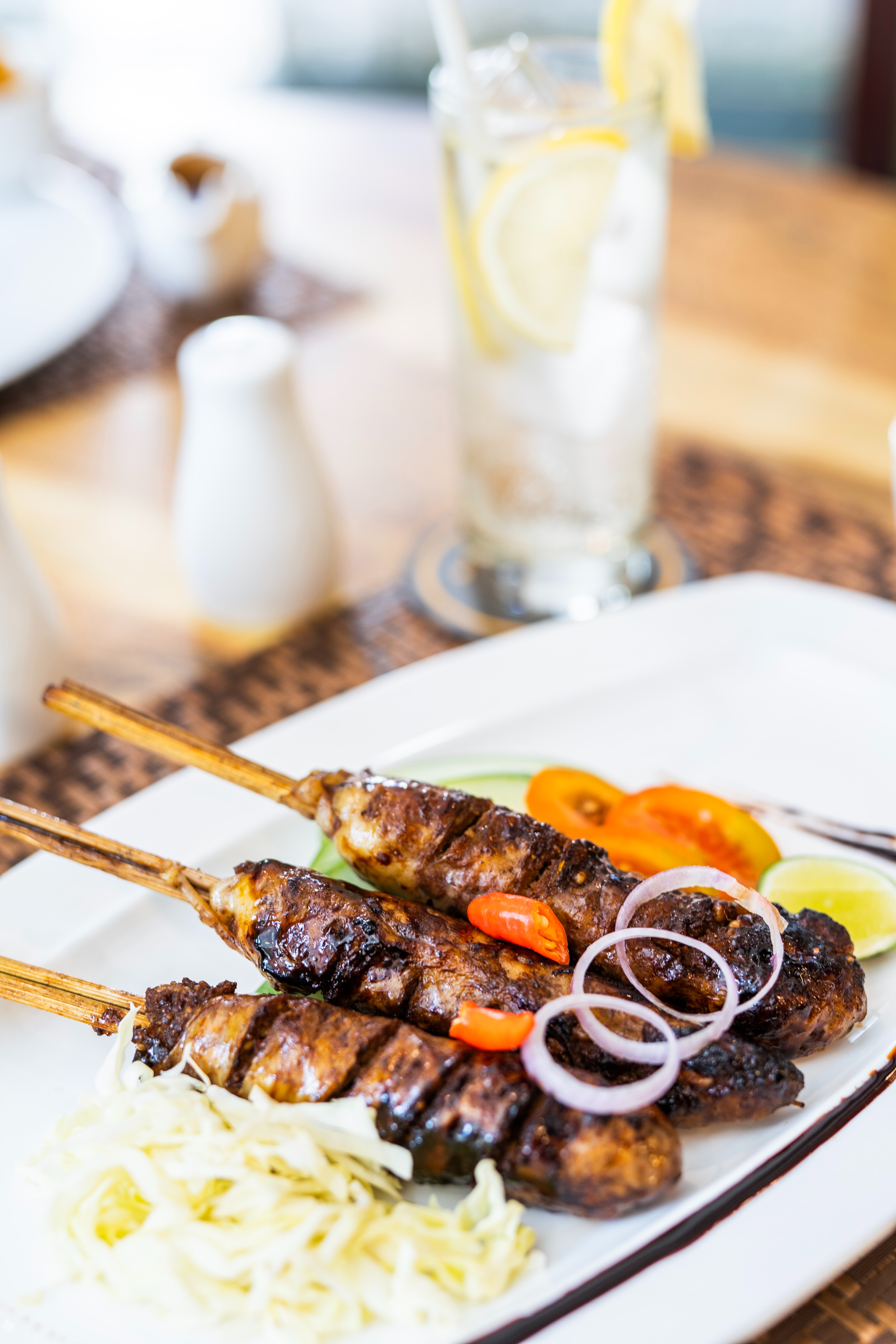 Chicken skewers on a plate