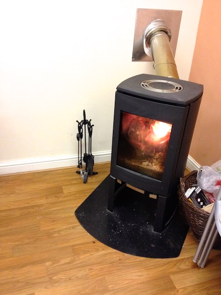 In colder months, a log burner complements the electric heating.
