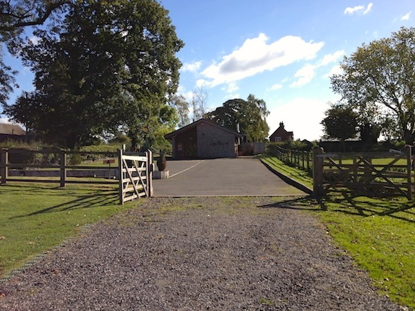 In front of the hall, there is a small 8-car car park with disabled area.