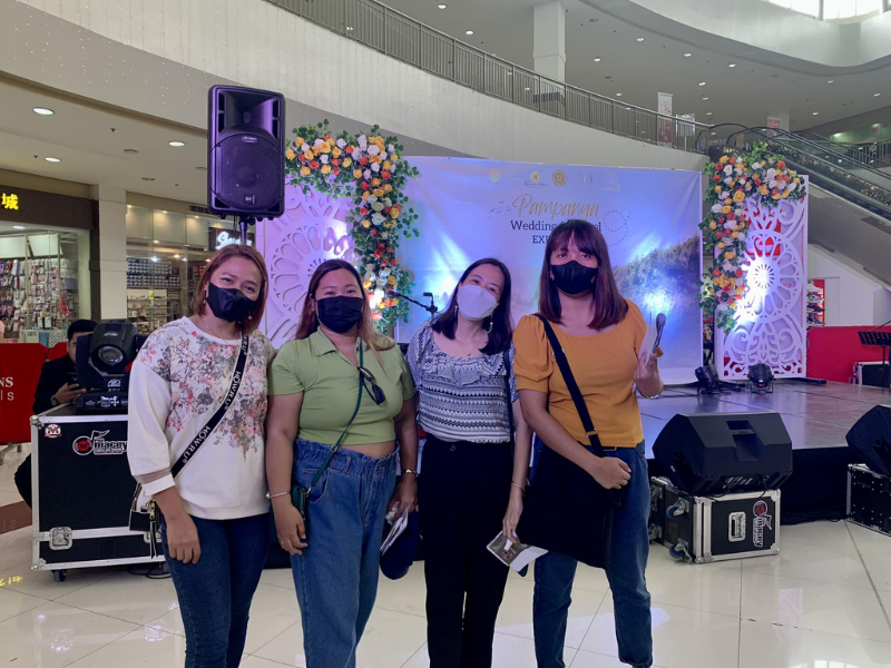 Model wearing plain gray basic tee.