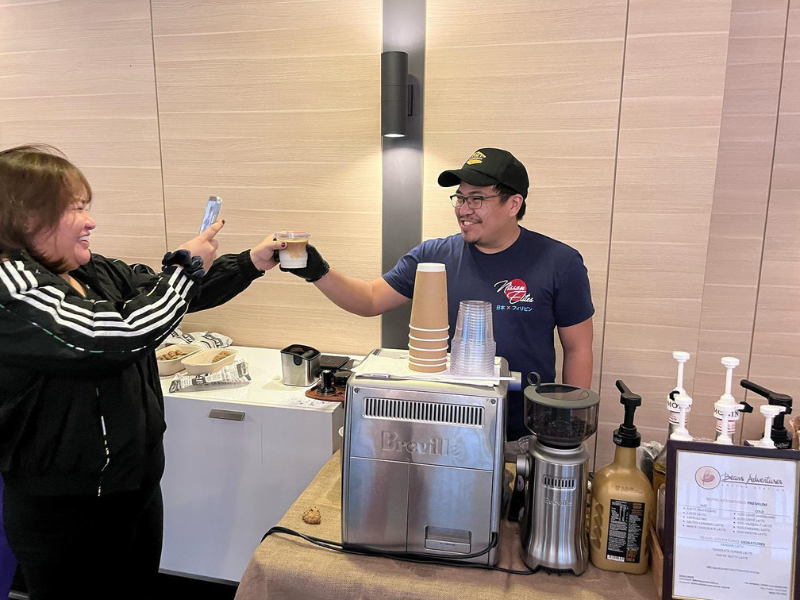 Model wearing plain black basic tee.
