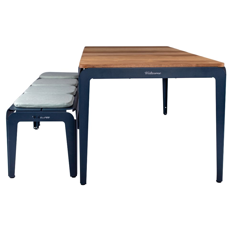 Weltevree-bended-table-wood-blue-bench-cushions