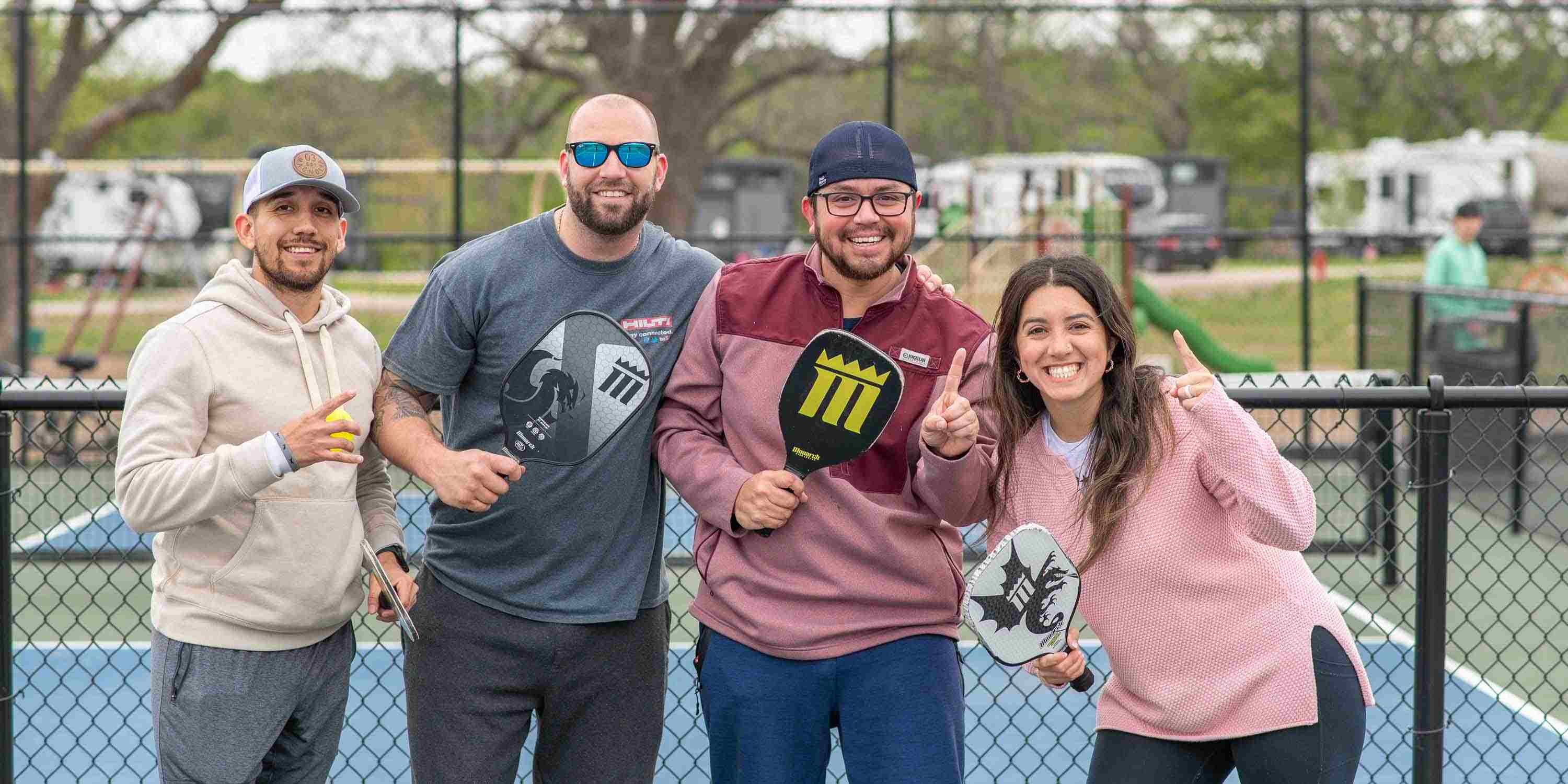 Camp Fimfo guests playing pickleball at our on-site sports courts