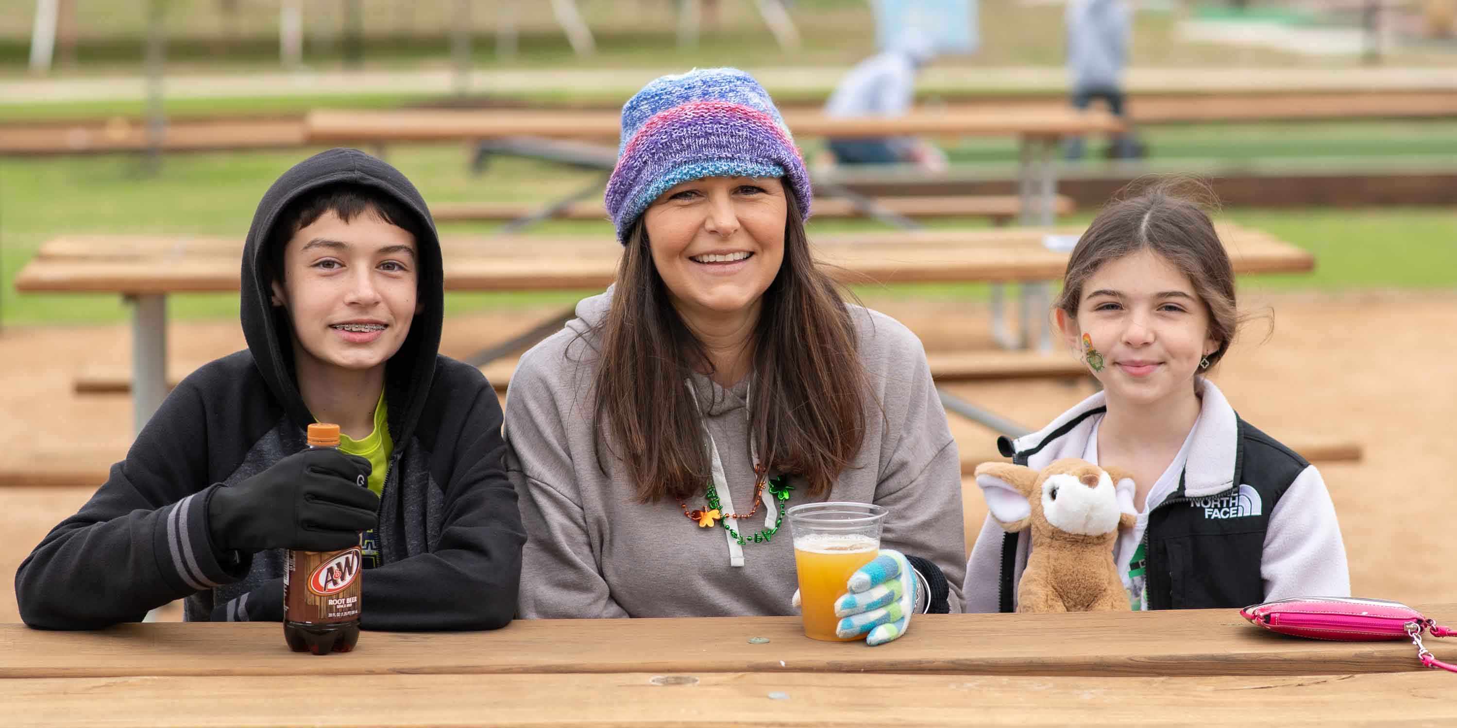 Happy campers smiling for a photo in the winter at Camp Fimfo