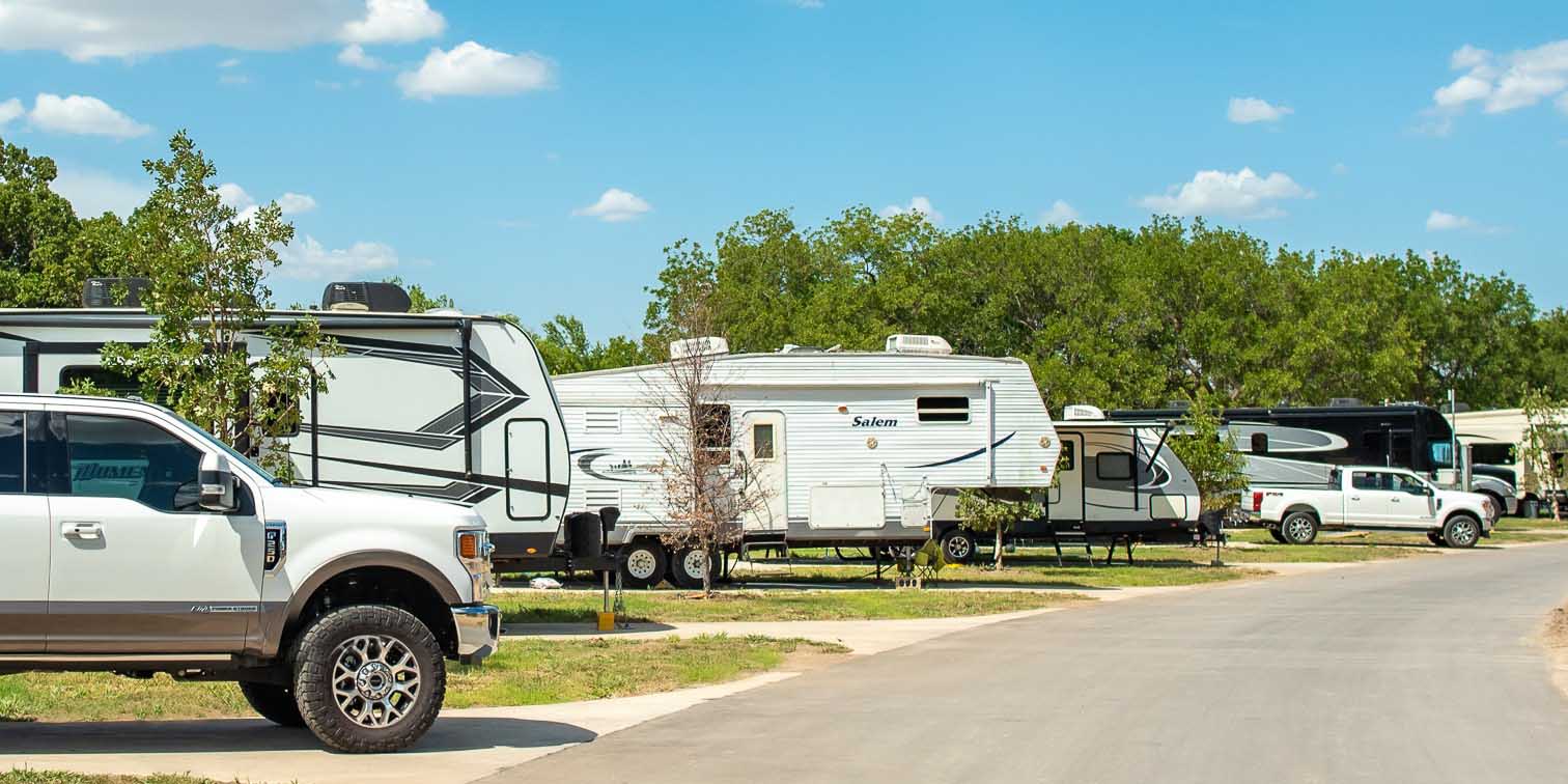 Pull-through RV sites at Camp Fimfo Waco