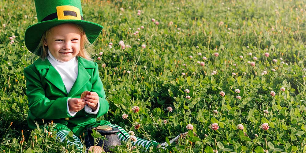 Girl celebrating St Patrick's Day at the St Patrick's Festival, River Parade, & River Dyeing in San Antonio.