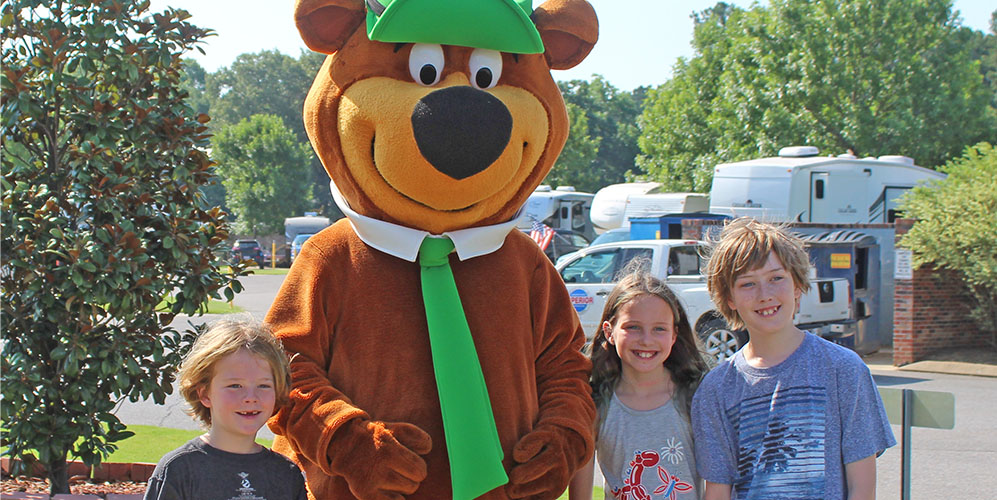 Yogi Bear™ and campers 