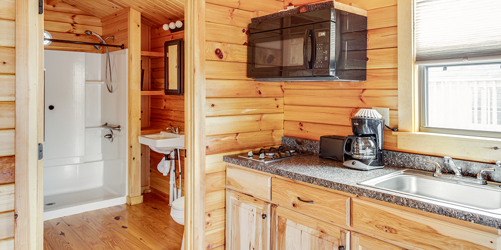 Glamping in New York can include amenities like a full kitchen and bathroom.