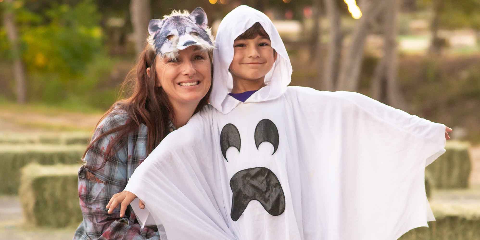 A mom and son dressed in costumes for Halloween Weekends at Camp Fimfo Texas Hill Country