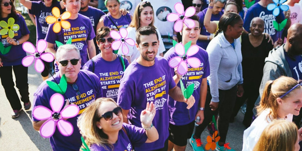 A group of people walking to end Alzheimers.