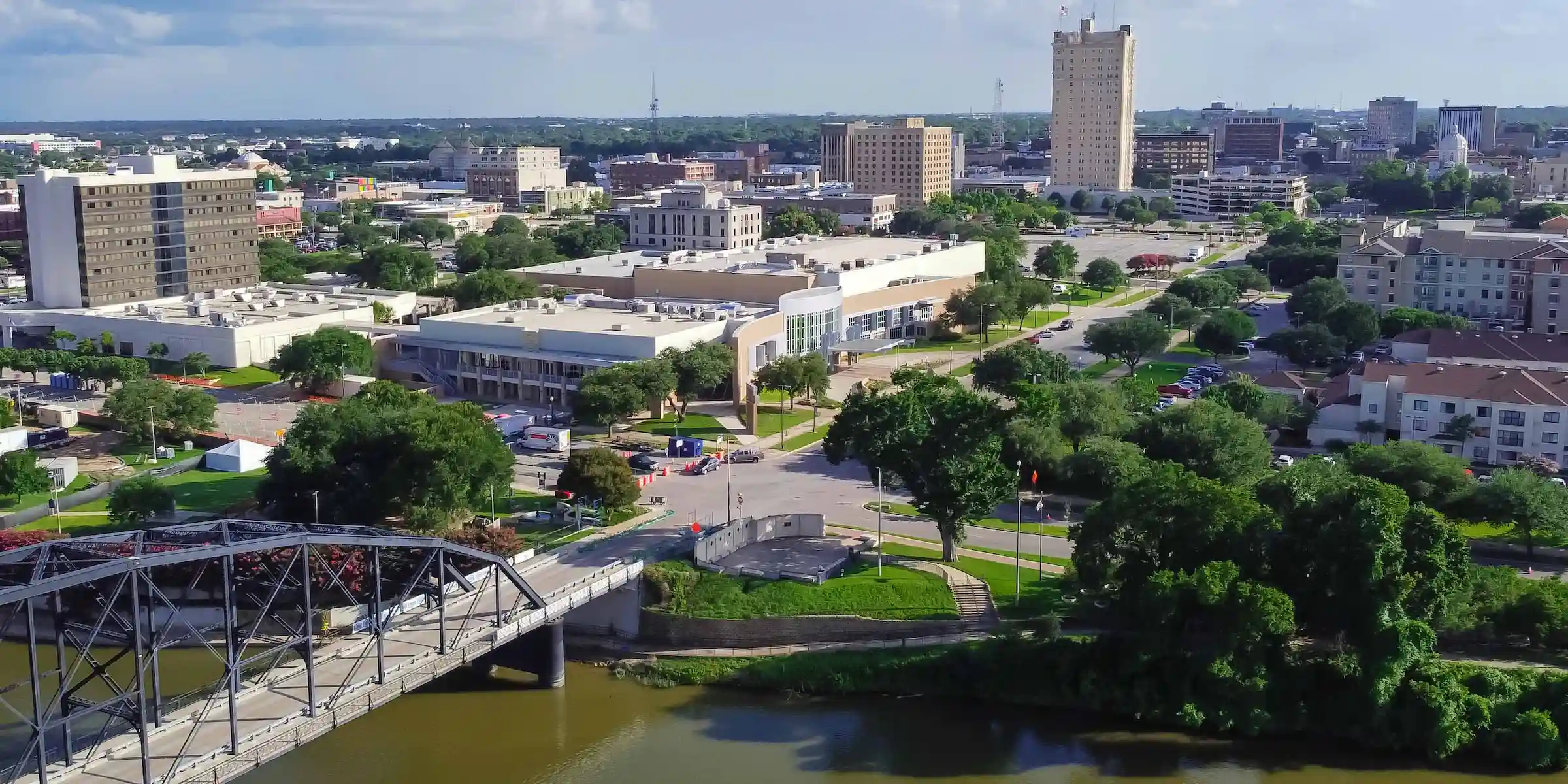 An aerial view of downtown Waco, Texas in the summertime, 5 miles from Camp Fimfo Waco