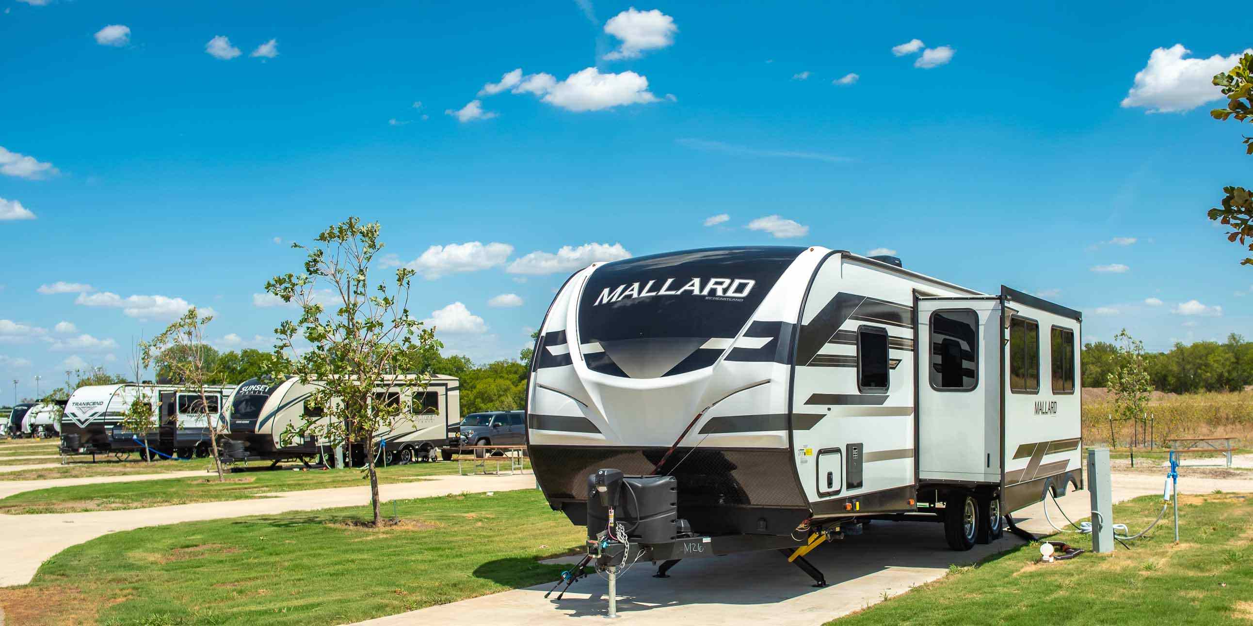 A pull-thru RV Site at Camp Fimfo Waco