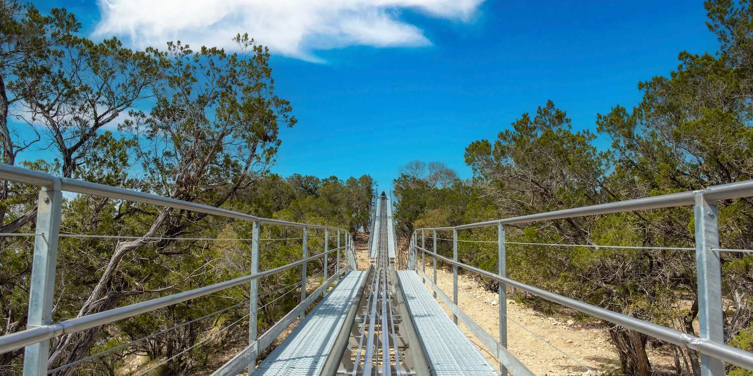 A closeup of The Cliff Carver, the first alpine coaster in Texas