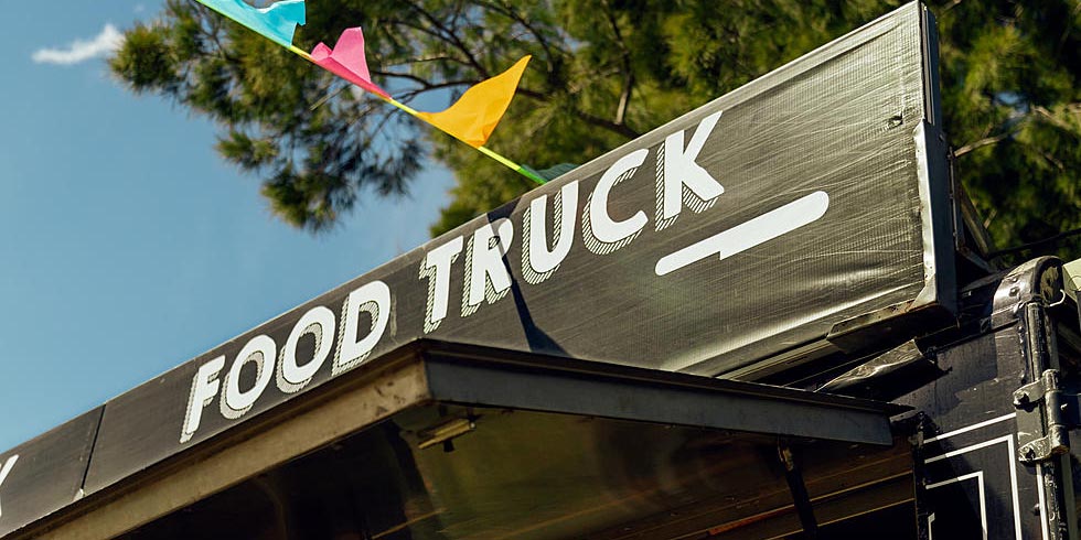 A food truck sign at one of Waco's signature events, the Texas Food Truck Showdown, happening in Downtown Waco, 5 miles from Camp Fimfo Waco.